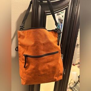 Sherpani orange and black shoulder or crossbody bag. Never used.